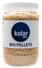 Kolar Labs Metabolix bio-pellets bottle-cap closeup illustrate compact resin for stable dosing.