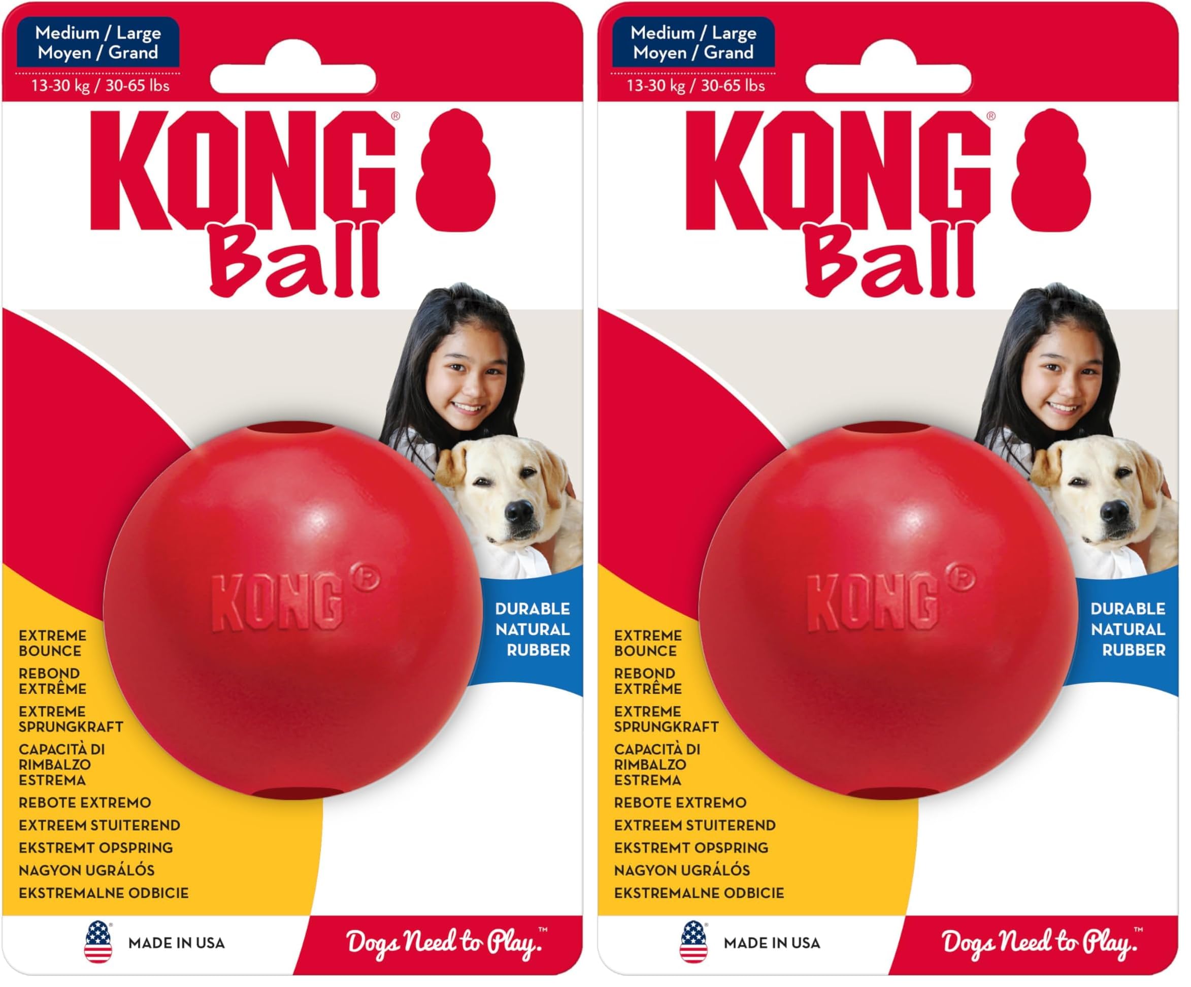 KONG Ball with Hole red fetch toy in grass for training and play.