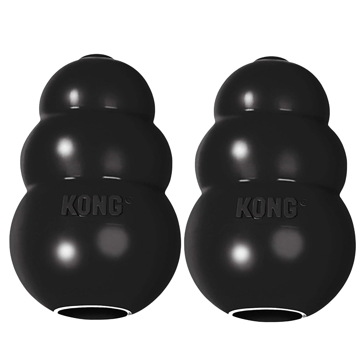 KONG Extreme black rubber dog toy in action during fetch for powerful chewers