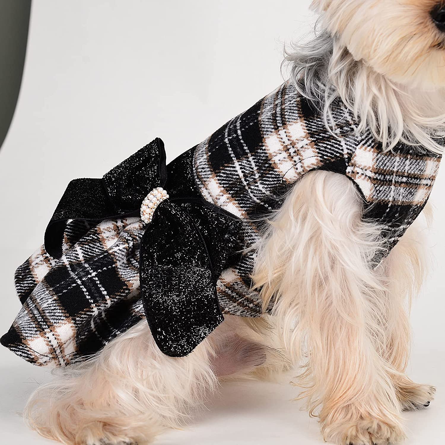 Kosiyi winter dress for dogs keeps warmth and makes pets party-ready.