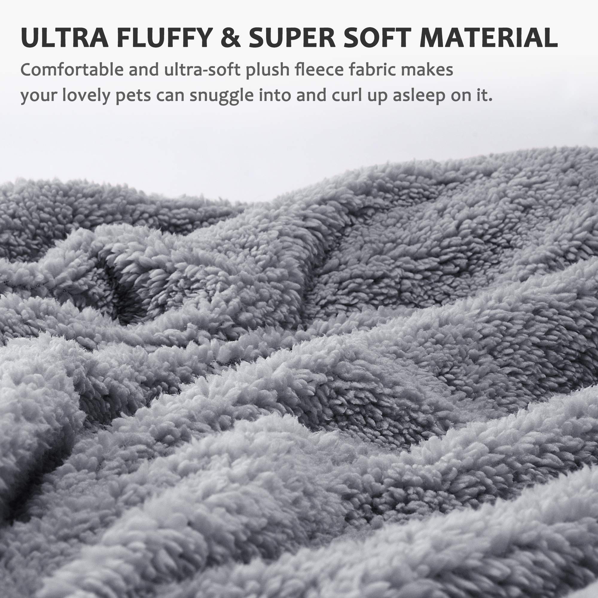 Kritter Planet dog blanket draped on sofa illustrating versatile use.