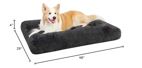 KSIIA dark gray dog bed in crate ready for everyday use.