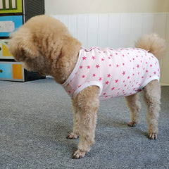 Close-up of Kukaster Pet recovery suit fabric highlighting soft breathable polyester for comfort.