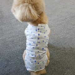 Kukaster Pet Recovery Suit Grey Stars XL worn indoors reduces shedding and keeps area clean.