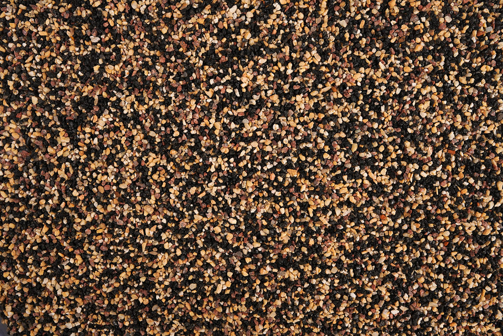 LANDEN Pangea sand contrast rocks pair naturally for cohesive hardscape designs.