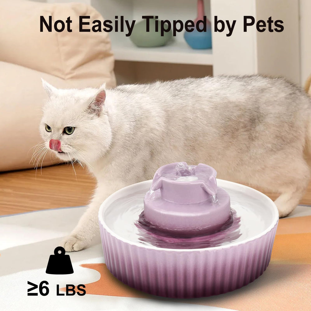 Lawfery purple cupcake-design fountain adds playful aesthetic to any room.