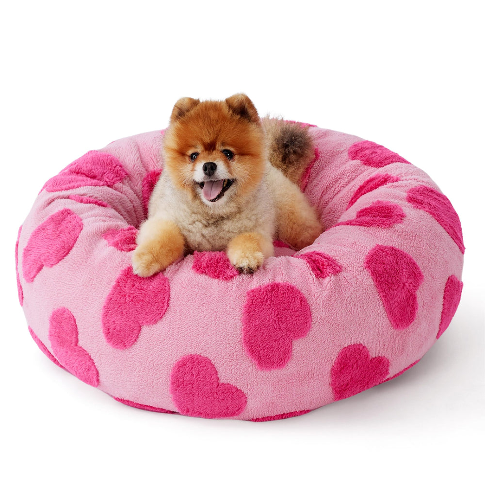 LE SURE heart-pink bed placed in a cozy room for home decor.