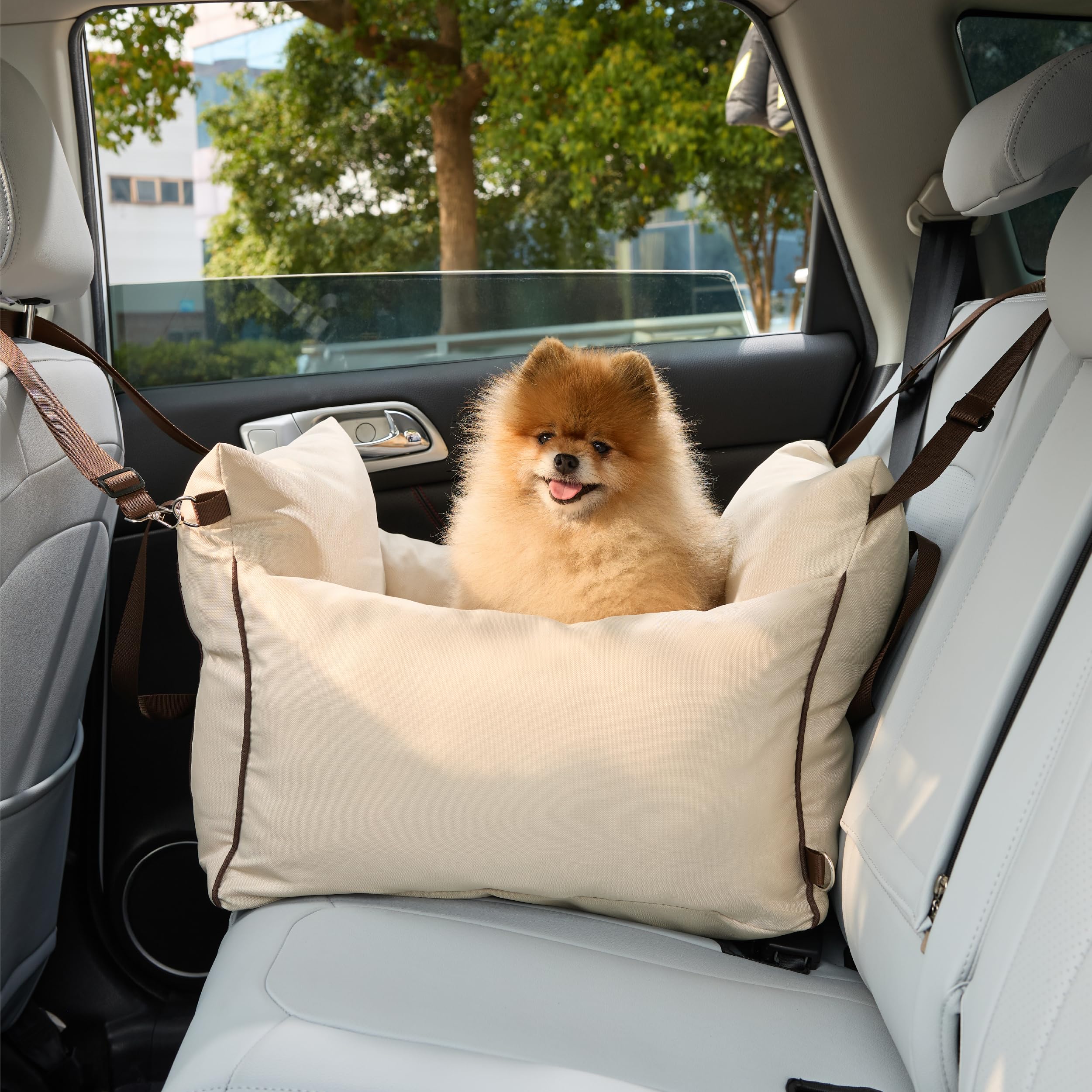 LE SURE Lesure beige travel bed in car during ride