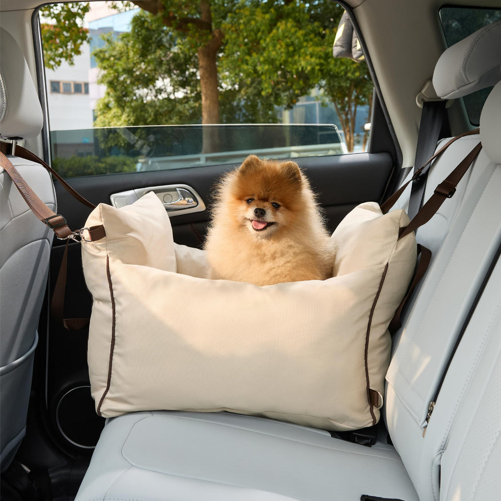 LE SURE Lesure beige travel bed in car during ride
