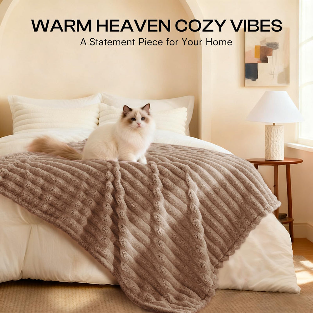 LINENLUX cat blanket provides soft napping comfort on a bed.