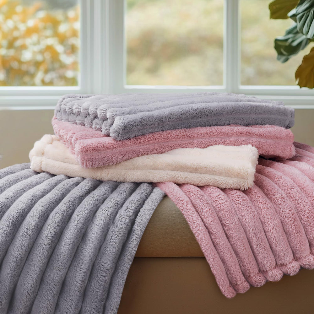 LINENLUX lightweight blanket suitable for indoor and outdoor use during travel.