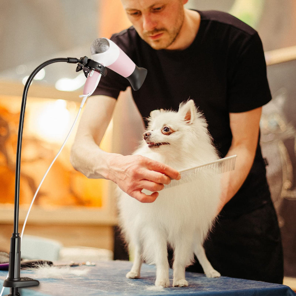 Linkidea stand in-use on a grooming table shows hands-free operation.