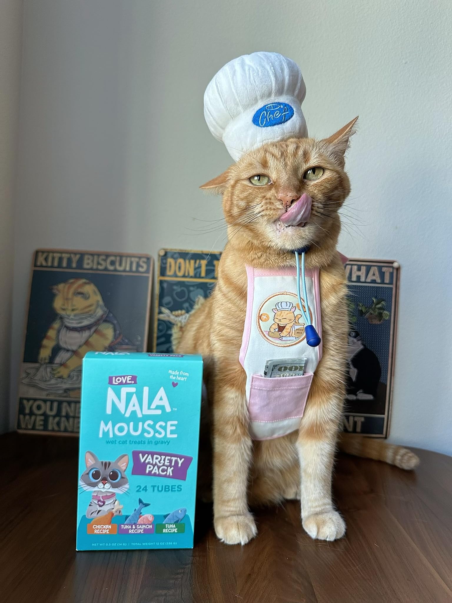 LOVE NALA content cat relaxed after treat indicating satisfaction and calm mood.
