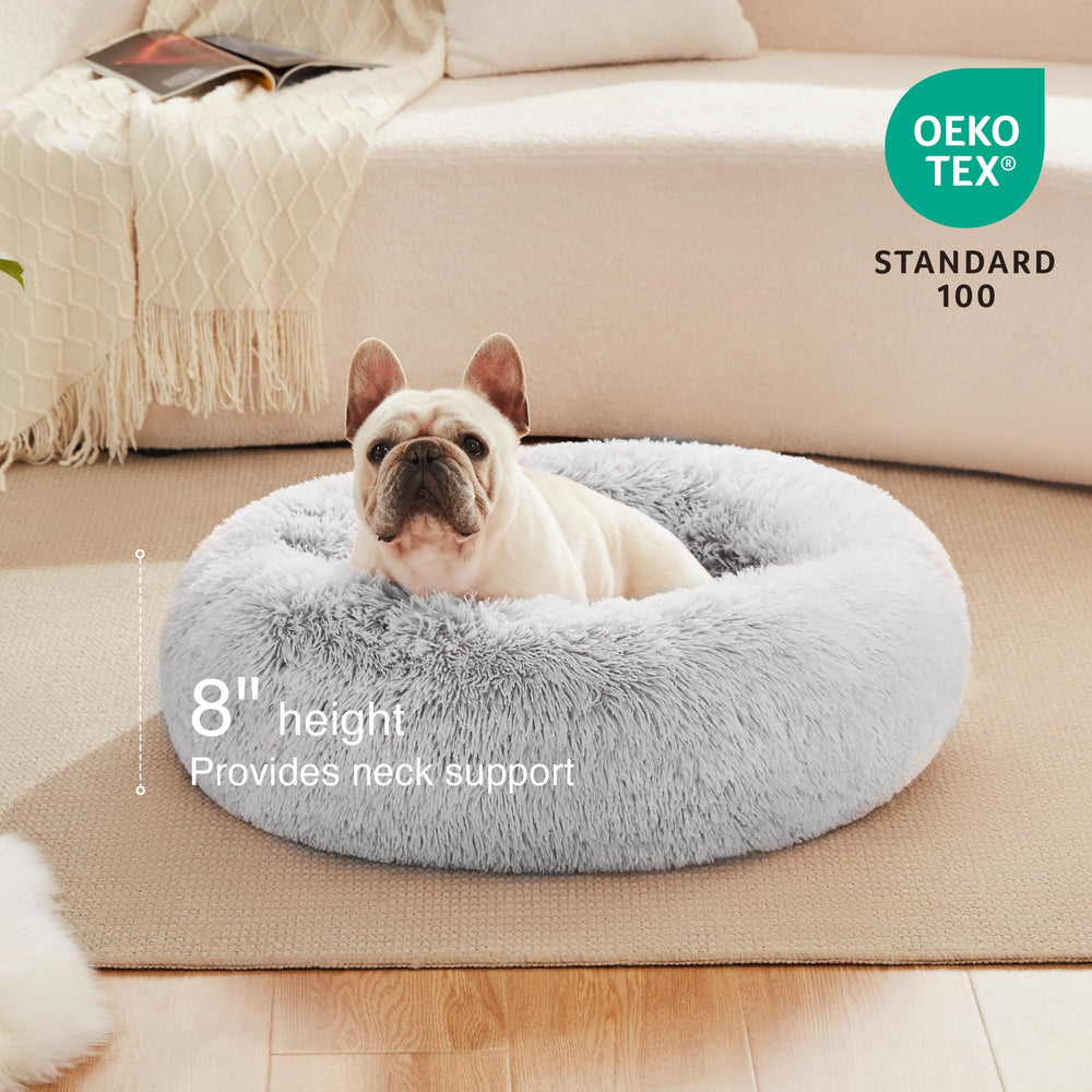 Love's cabin anti-anxiety donut dog bed in grey provides comfortable, elevated head and neck support.