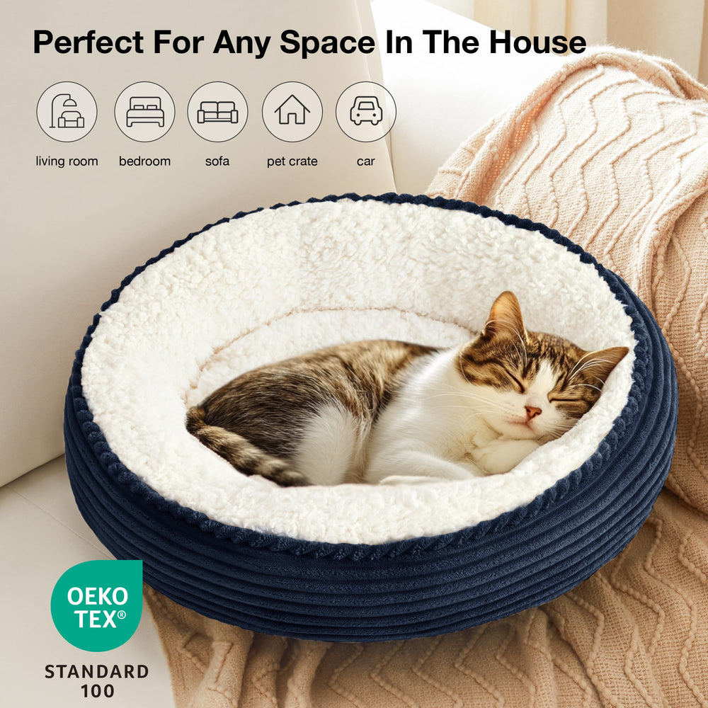 Love's cabin navy stripe donut-shape bed highlights cozy nest and neck support.