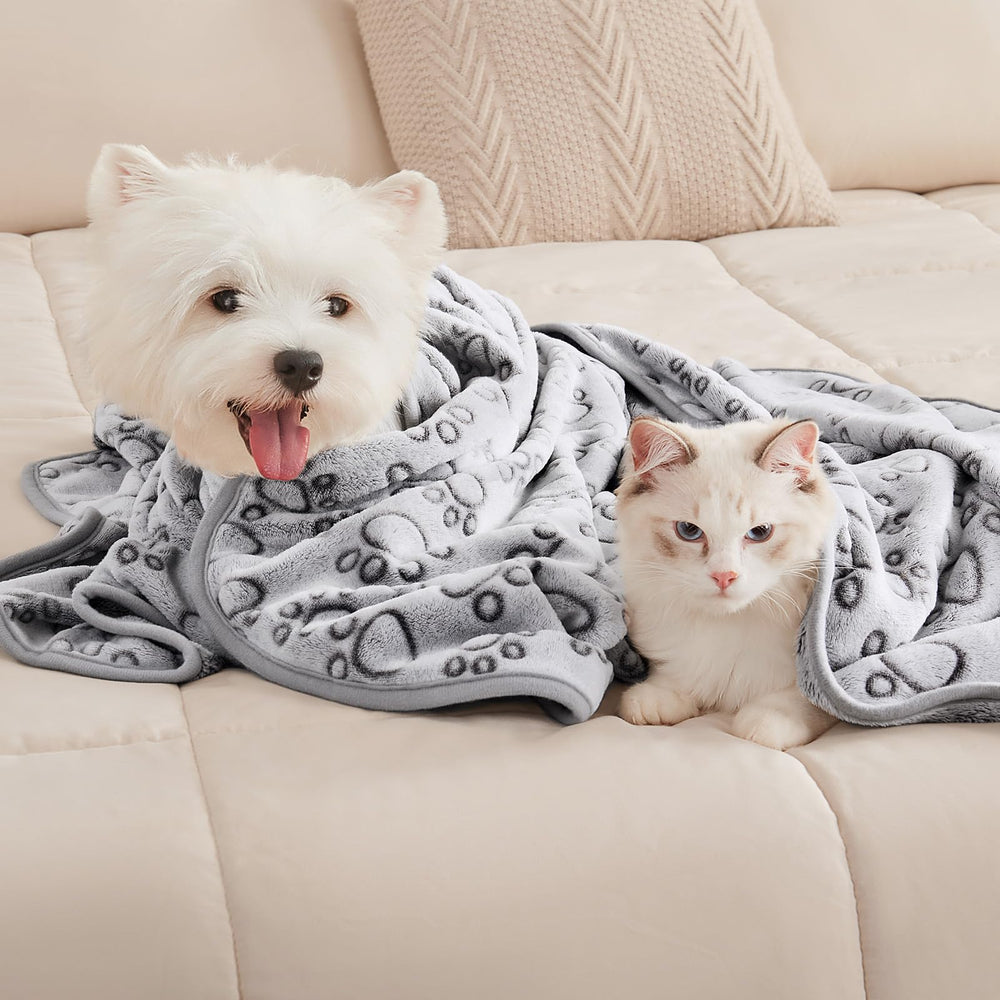 Luciphia 1 Pack 3 Blankets grey paw design adds charm and comfort.