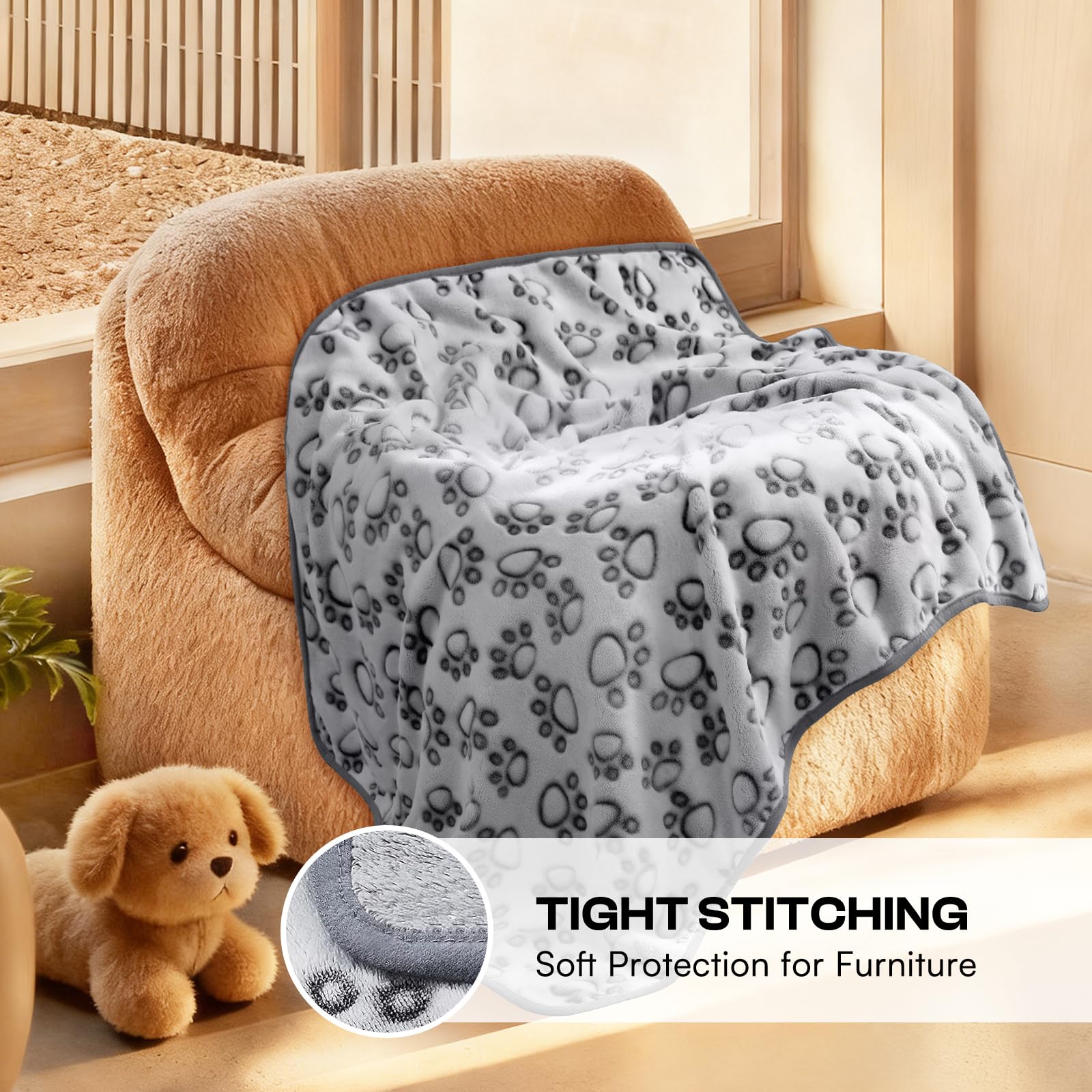 Luciphia large 41x31 inch blanket placed on a sofa for pets.
