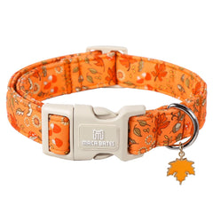 Maca Bates Fall Dog Collar with maple leaf charm on orange print for stylish walks