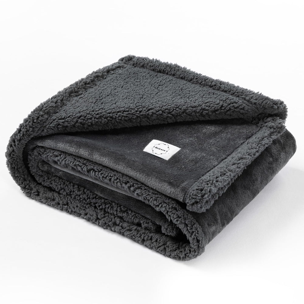 Maidewow XL 85x57in blanket protects couches and beds from pet messes.