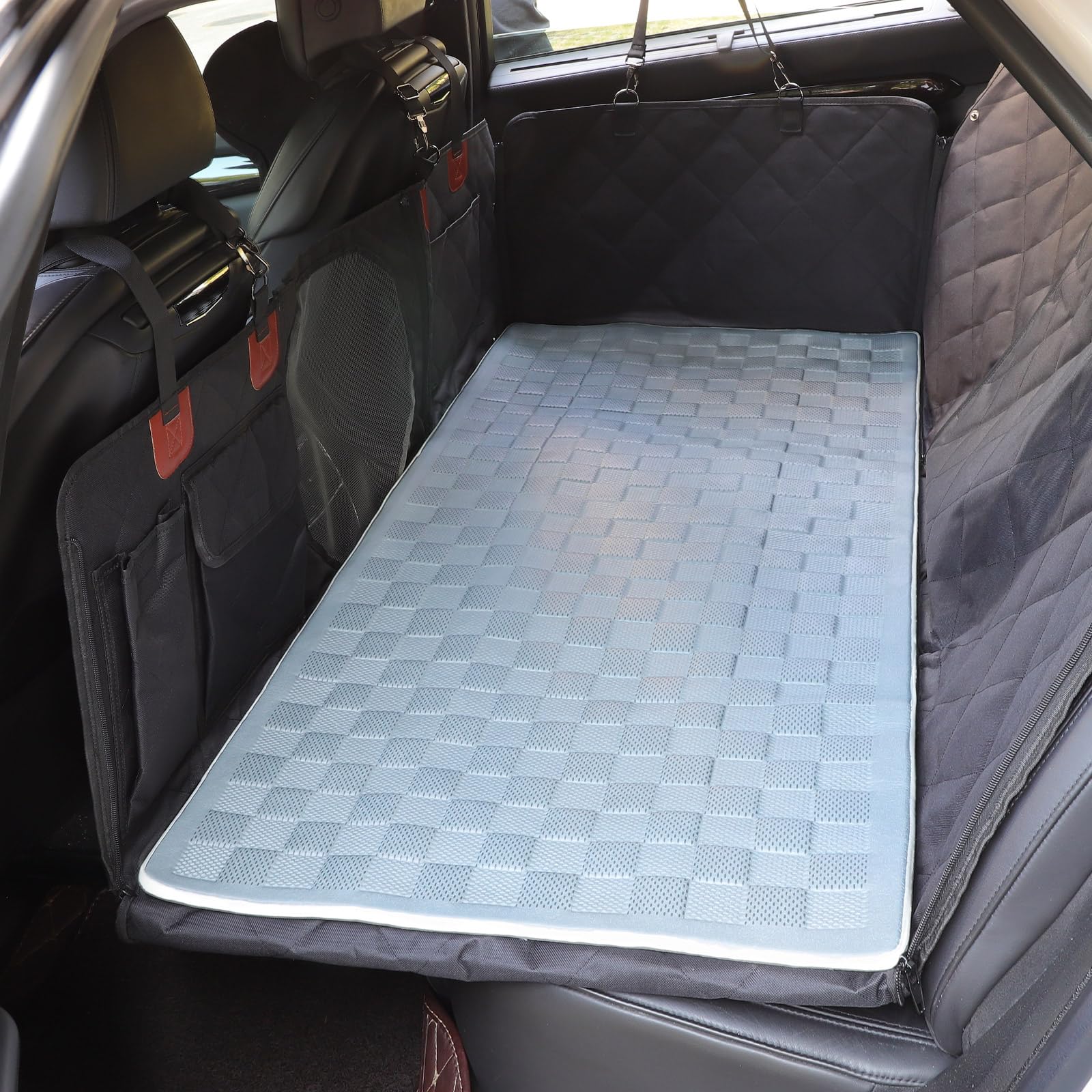 Manificent non-slip pet bed mat on back seat extender offers secure grip for safer rides.