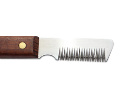 Mars Coat King stripping knife close-up highlighting coarse teeth for precise undercoat plucking