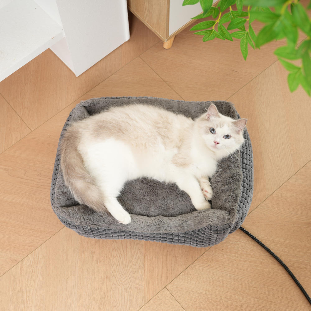 MARUNDA heated pets bed side view demonstrates sturdy build and cozy sitting area ideal for daily lounging