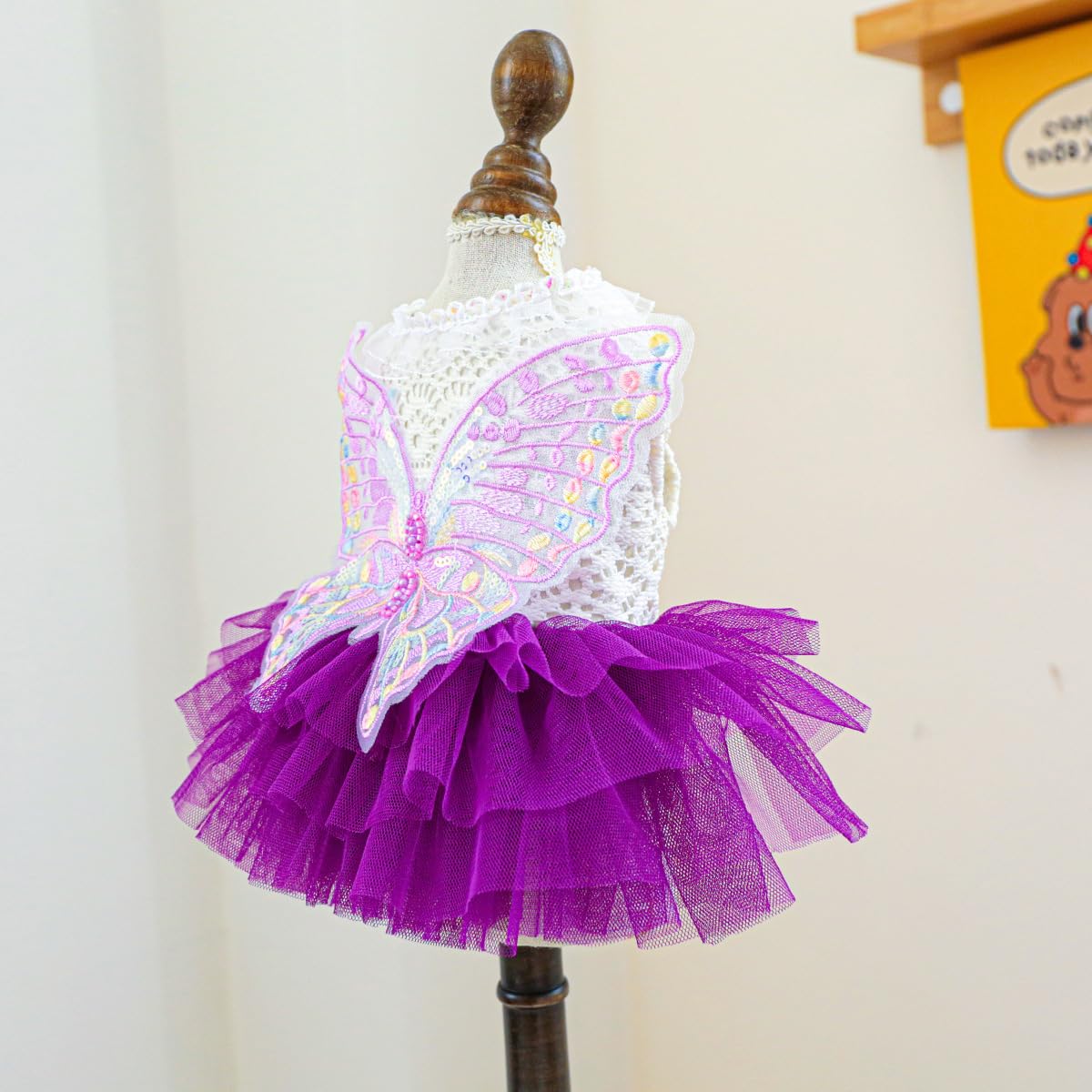 MaruPet back-view dress shows tutu and lace accents for elegant flair
