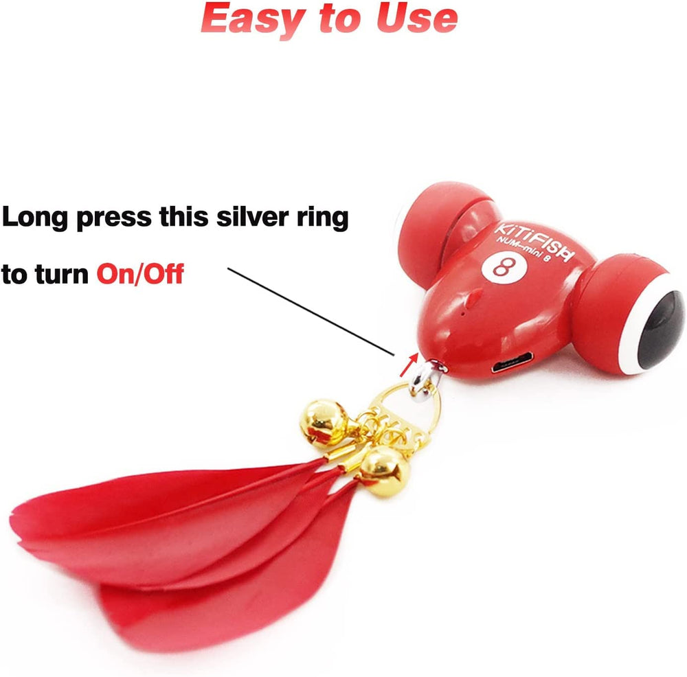MayMaw KiTiFISH toy with feather and bell for sensory stimulation.