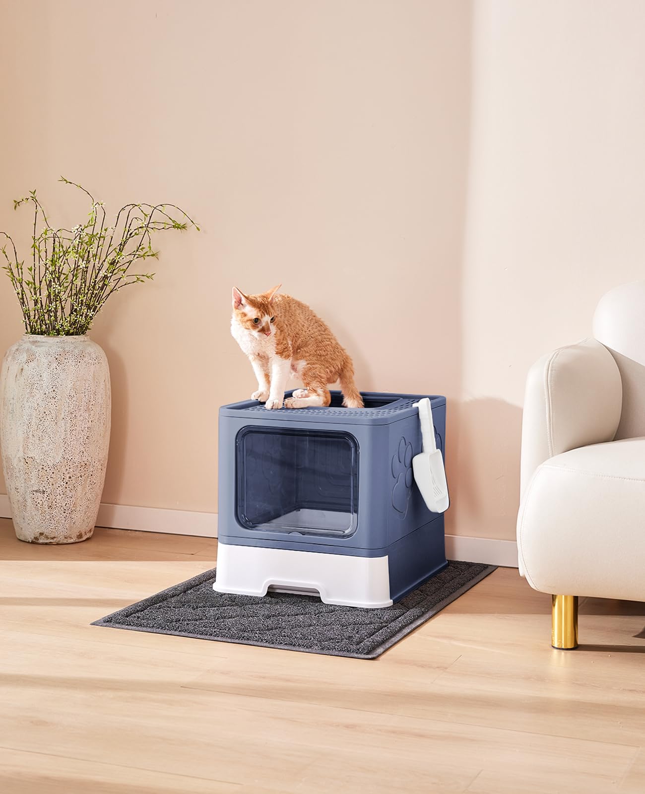 Medario top sand pedal minimizes litter spray during scooping.
