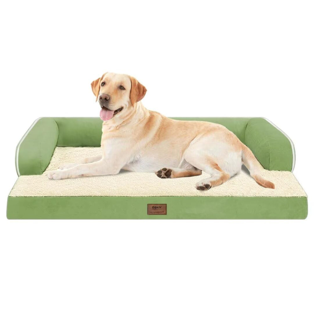 MEKIY dog sleeping peacefully on a grass-green bed.