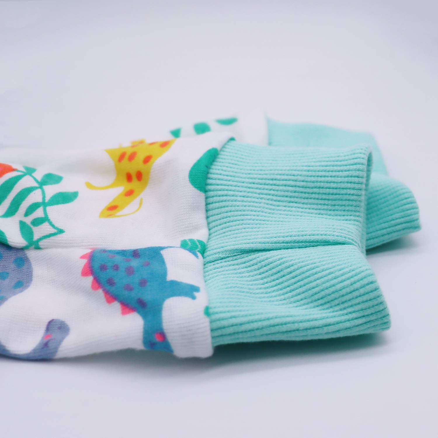 Miaododo White Dinosaur recovery suit fabric close-up reveals lightweight cotton comfort
