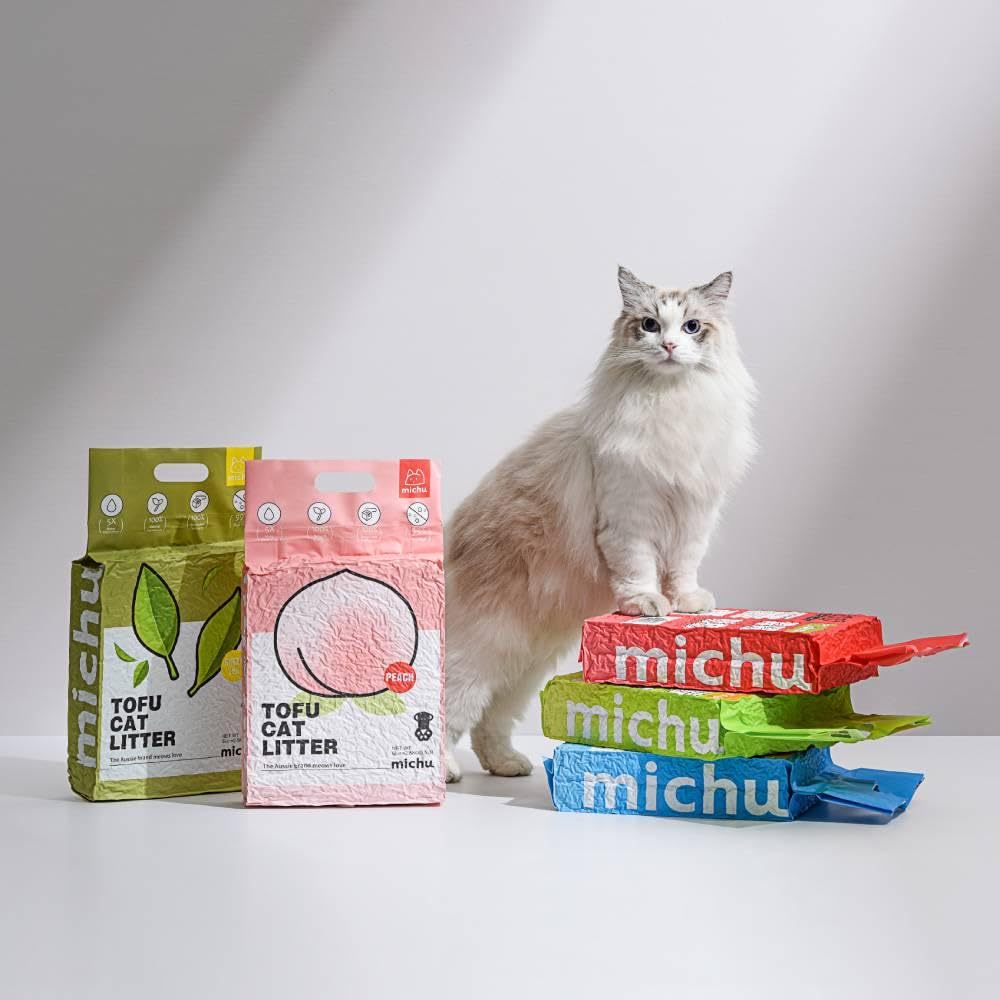 Michu tofu cat litter quick clumps form in tray for easy scooping.