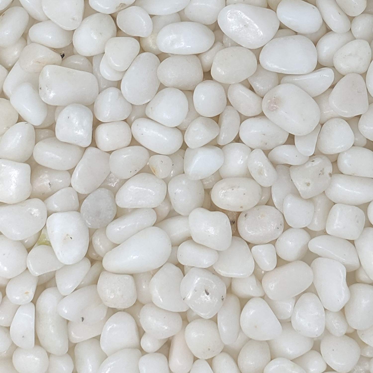 Midwest Hearth polished white pebbles 38-inch closeup highlighting glossy shine for decor accents.