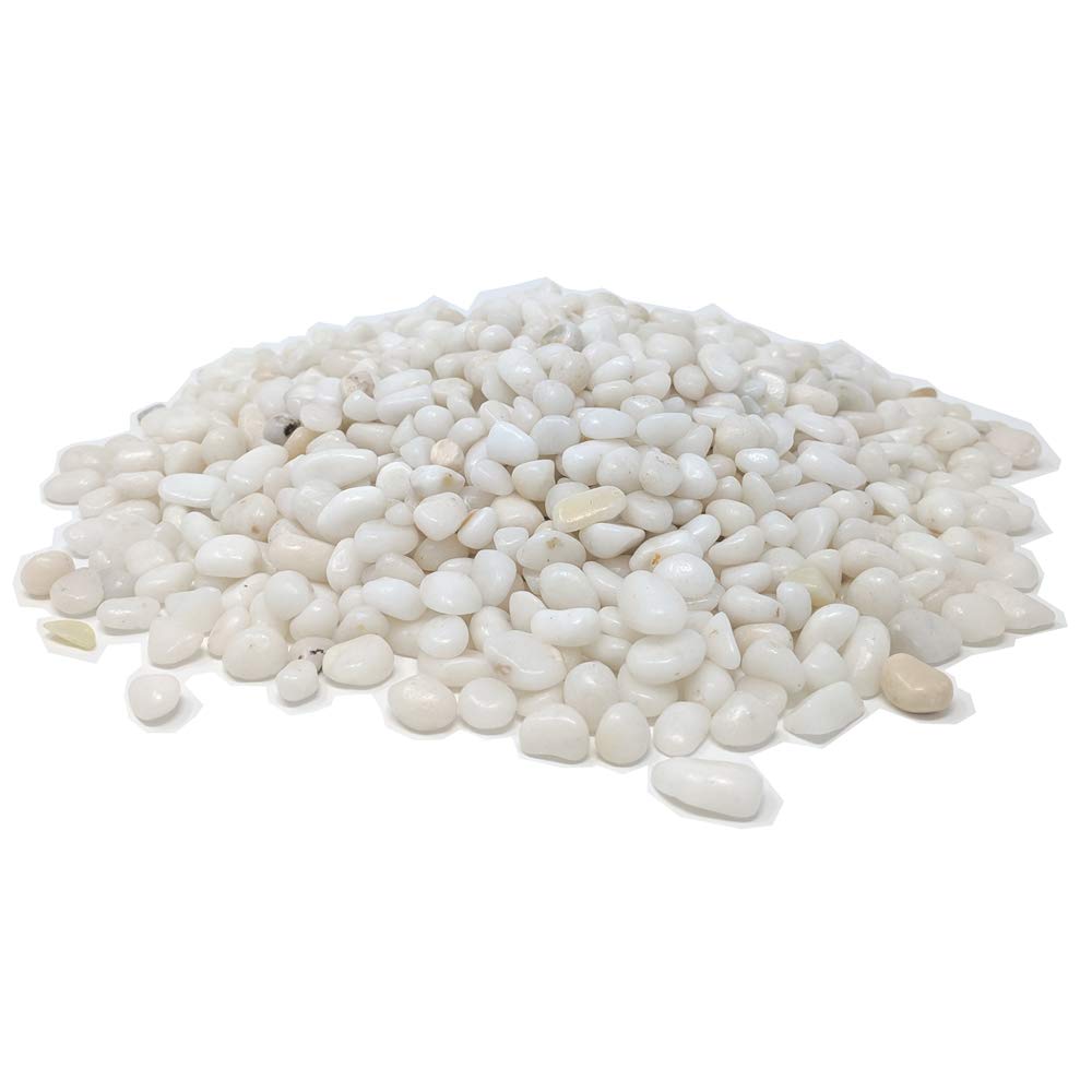 Midwest Hearth polished white pebbles flower arrangement reflecting light for bright decor.