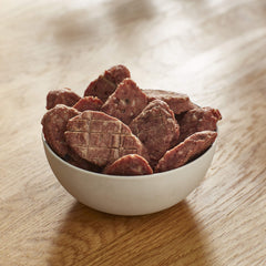 Milo's Kitchen beef slices on plate demonstrates serving size and portion control.