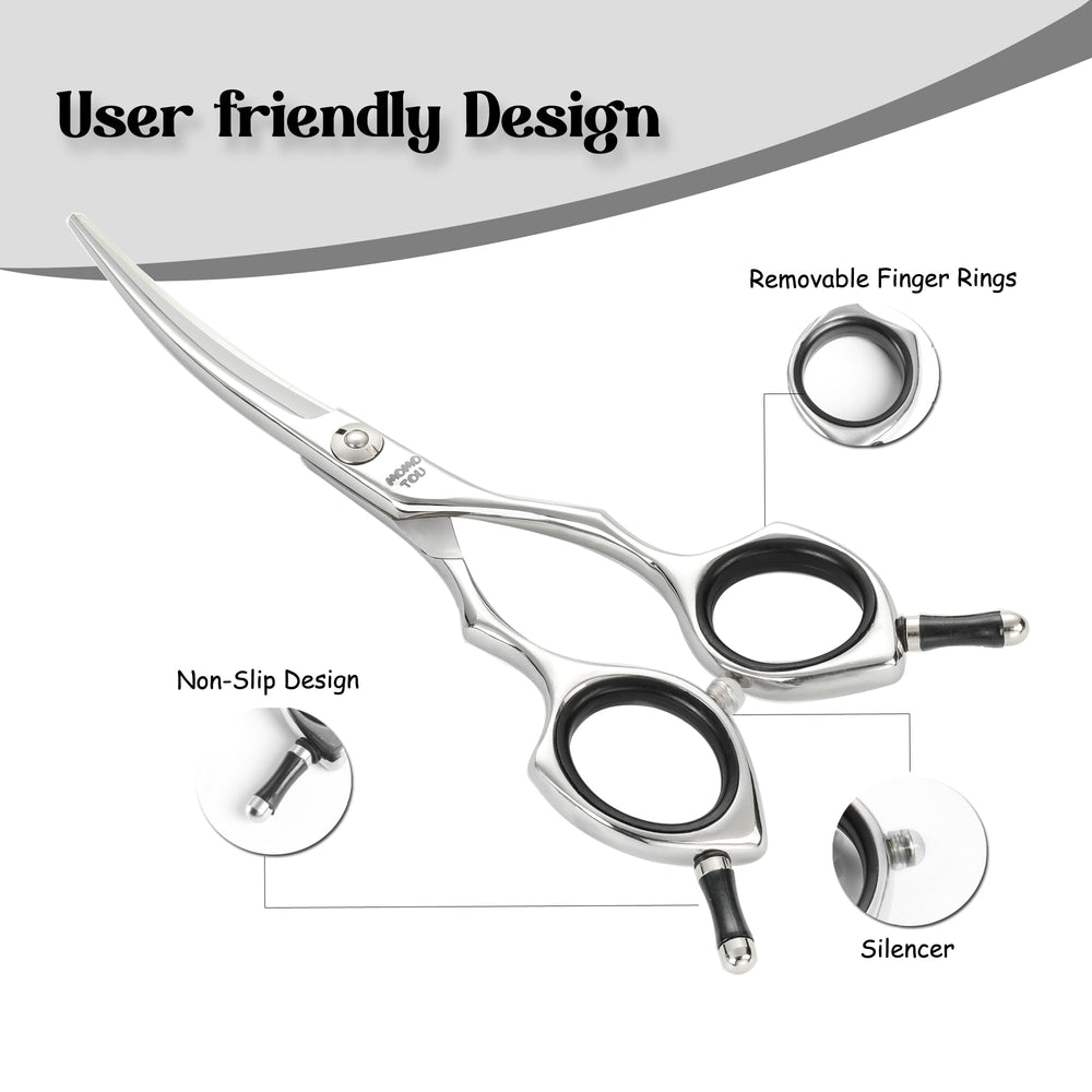 Momotou dog grooming scissors ergonomic handle closeup showing offset design for reduced hand fatigue.