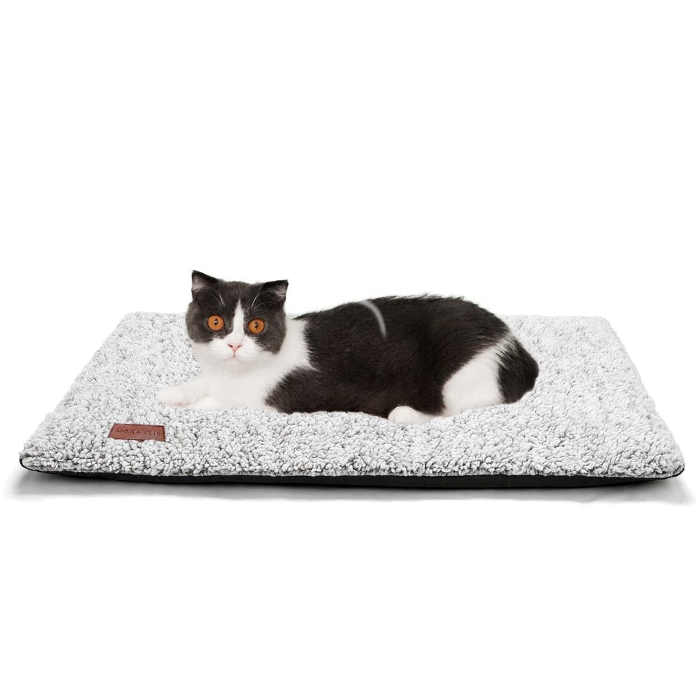 Mora Pets self-warming bed anti-slip bottom helps keep the pad in place.