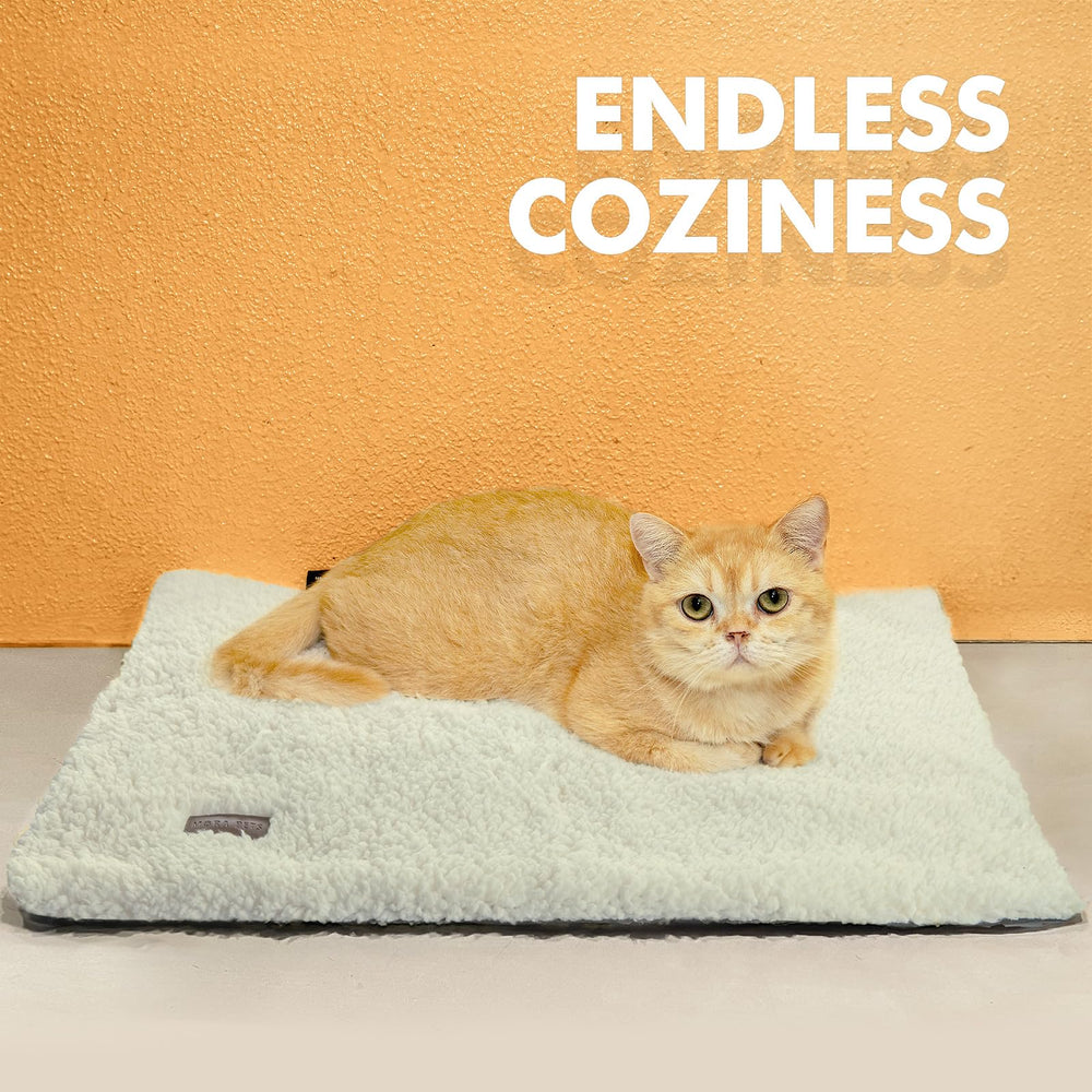 Mora Pets self-warming cat bed outdoor-ready design keeps pets warm outside.