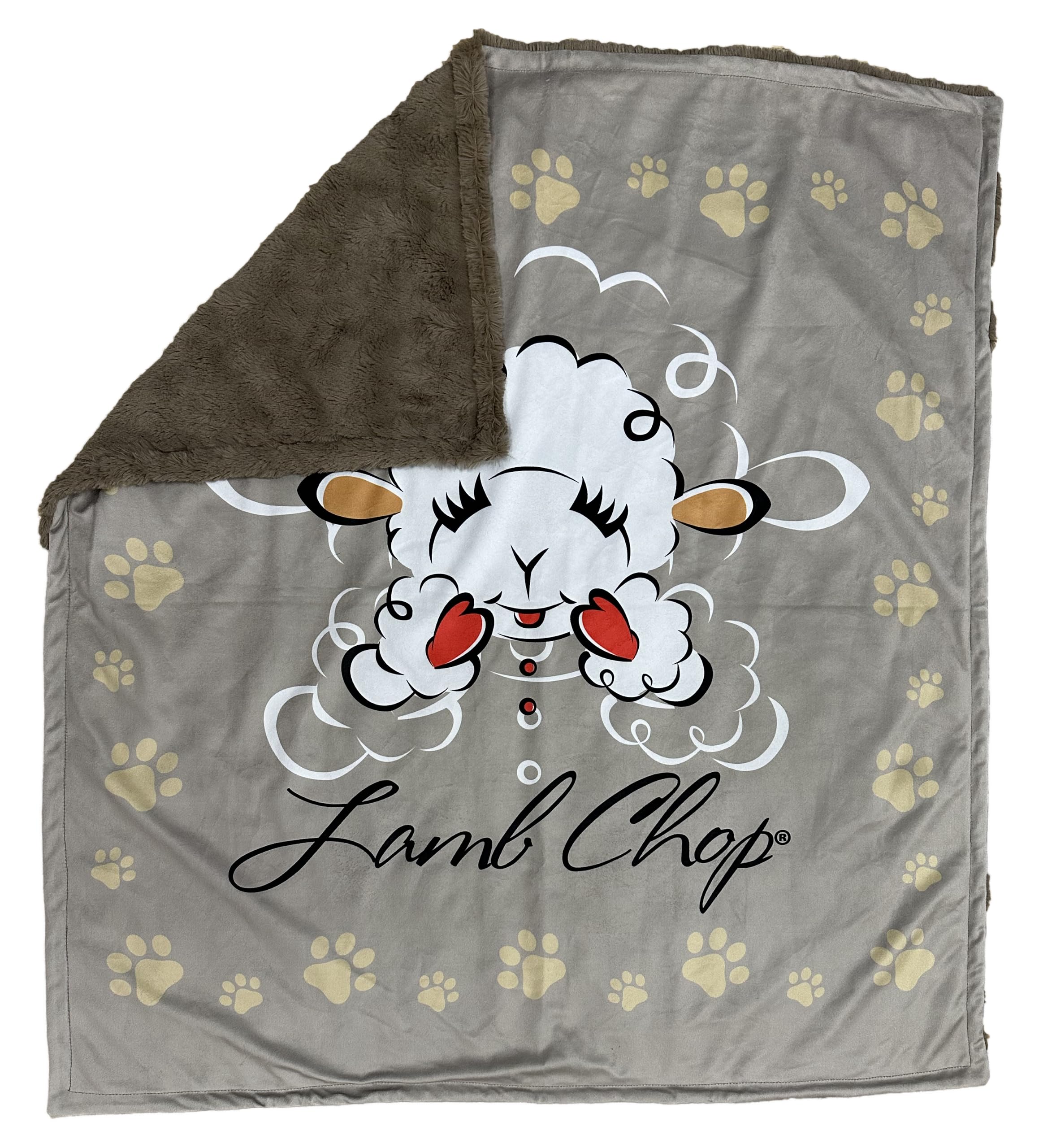 Multipet Lamb Chop Blanket laid beside a dog for cozy snuggle sessions.