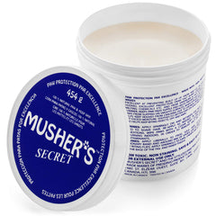 Musher's Secret paw wax jar provides an all-natural barrier to protect paws in heat and cold.