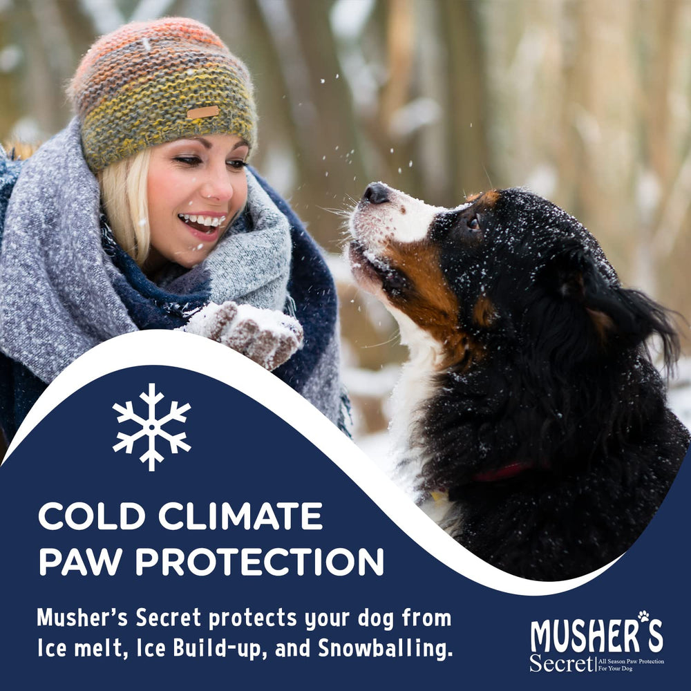 Musher's Secret paw wax sealed barrier on paw highlights invisible protection against weather.