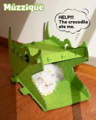 Muzzique Cat Bed House scratching pad area emphasizes built-in scratching for happy claws.