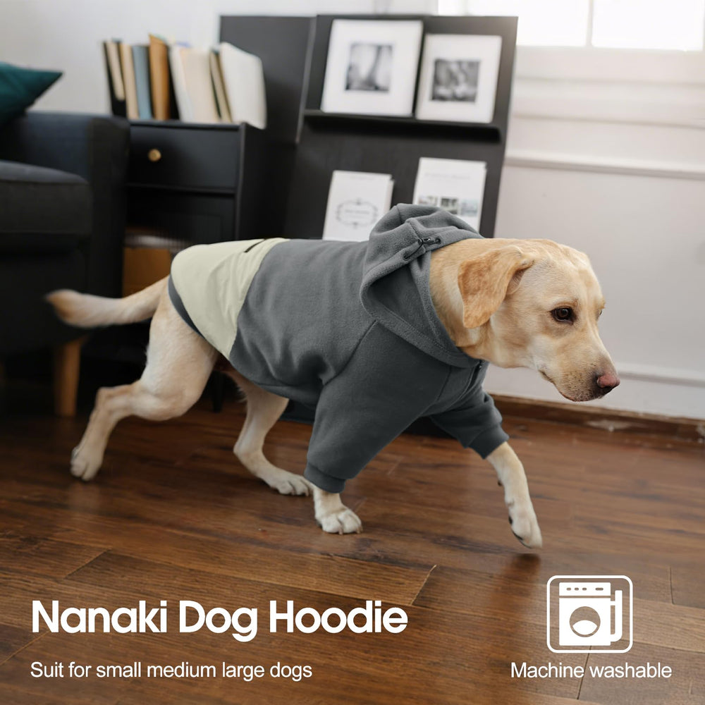 Nanaki dog hoodie worn on dog during walk demonstrates practical outdoor warmth.