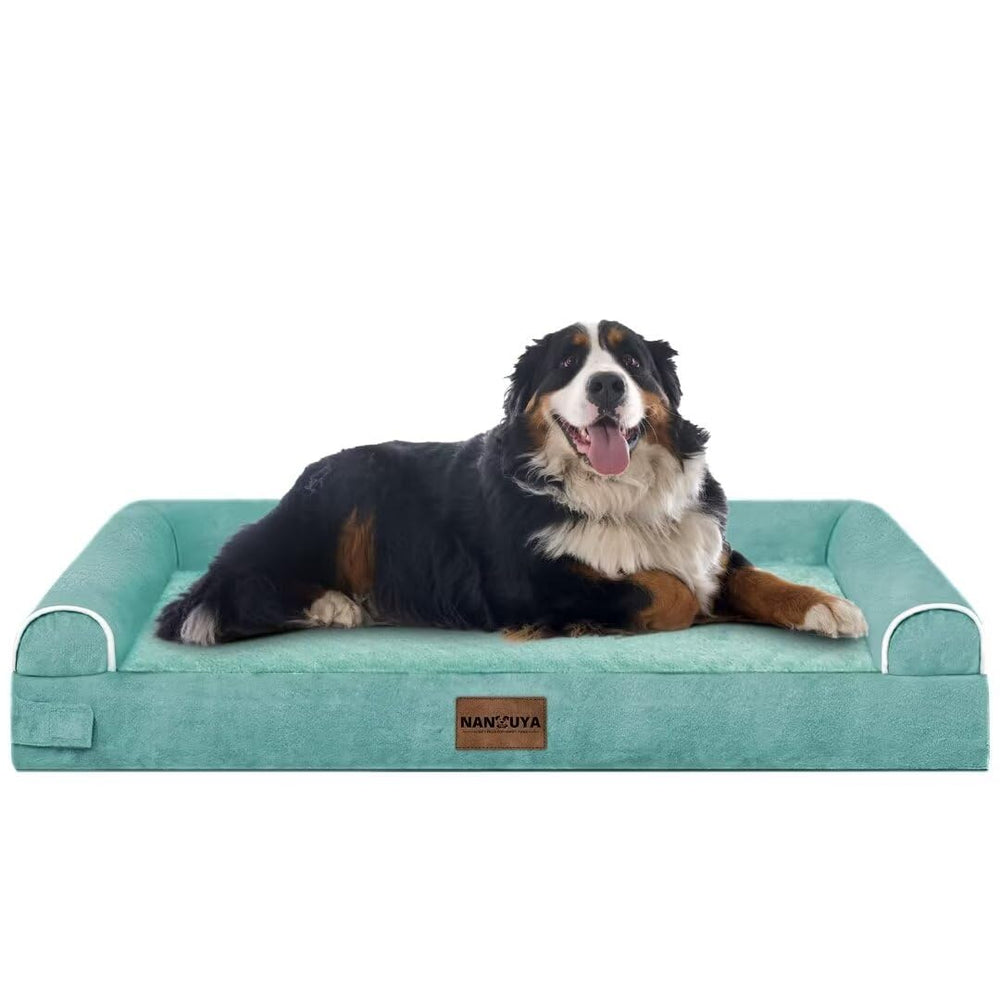 NANUYA aqua-blue bed blends with modern decor and cozy comfort.