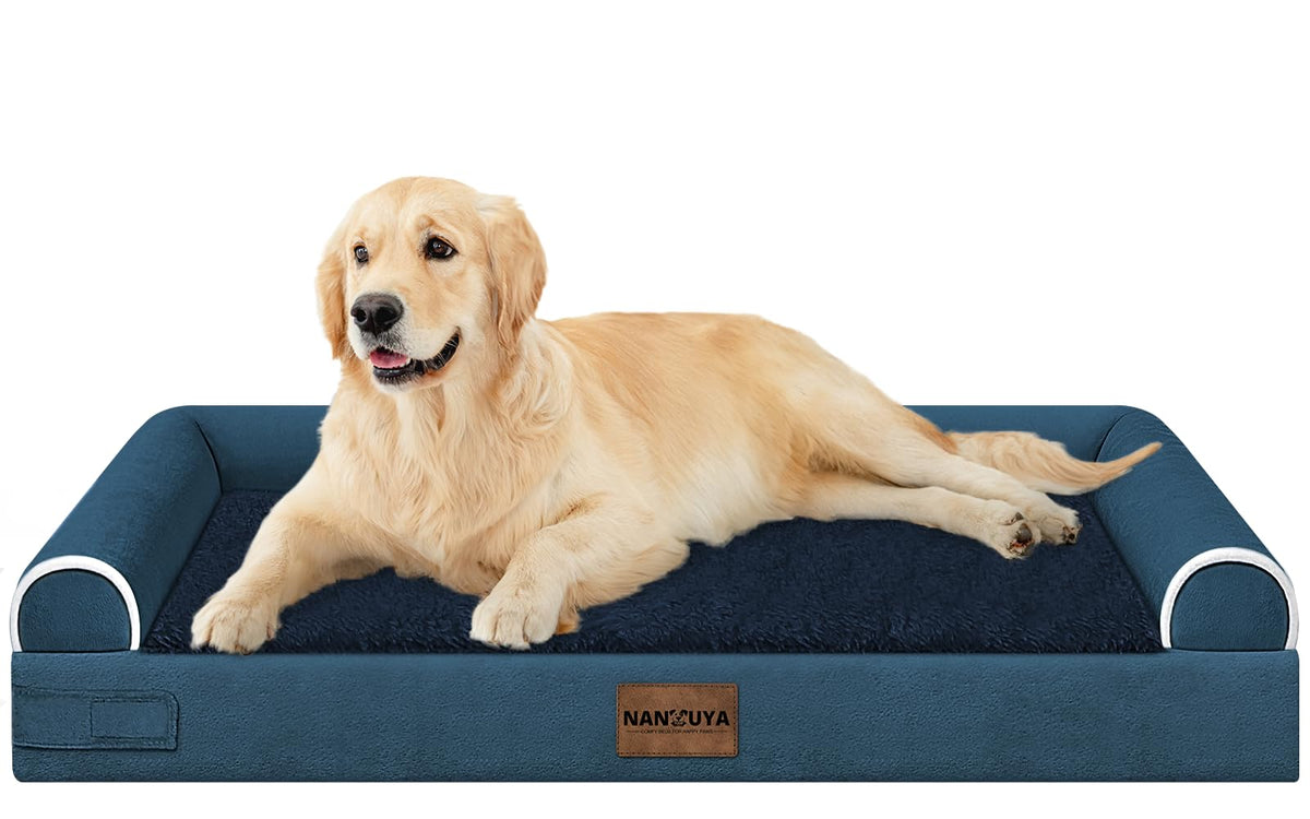 NANUYA large orthopedic dog bed with navy cover showing the foam surface for joint-friendly support.