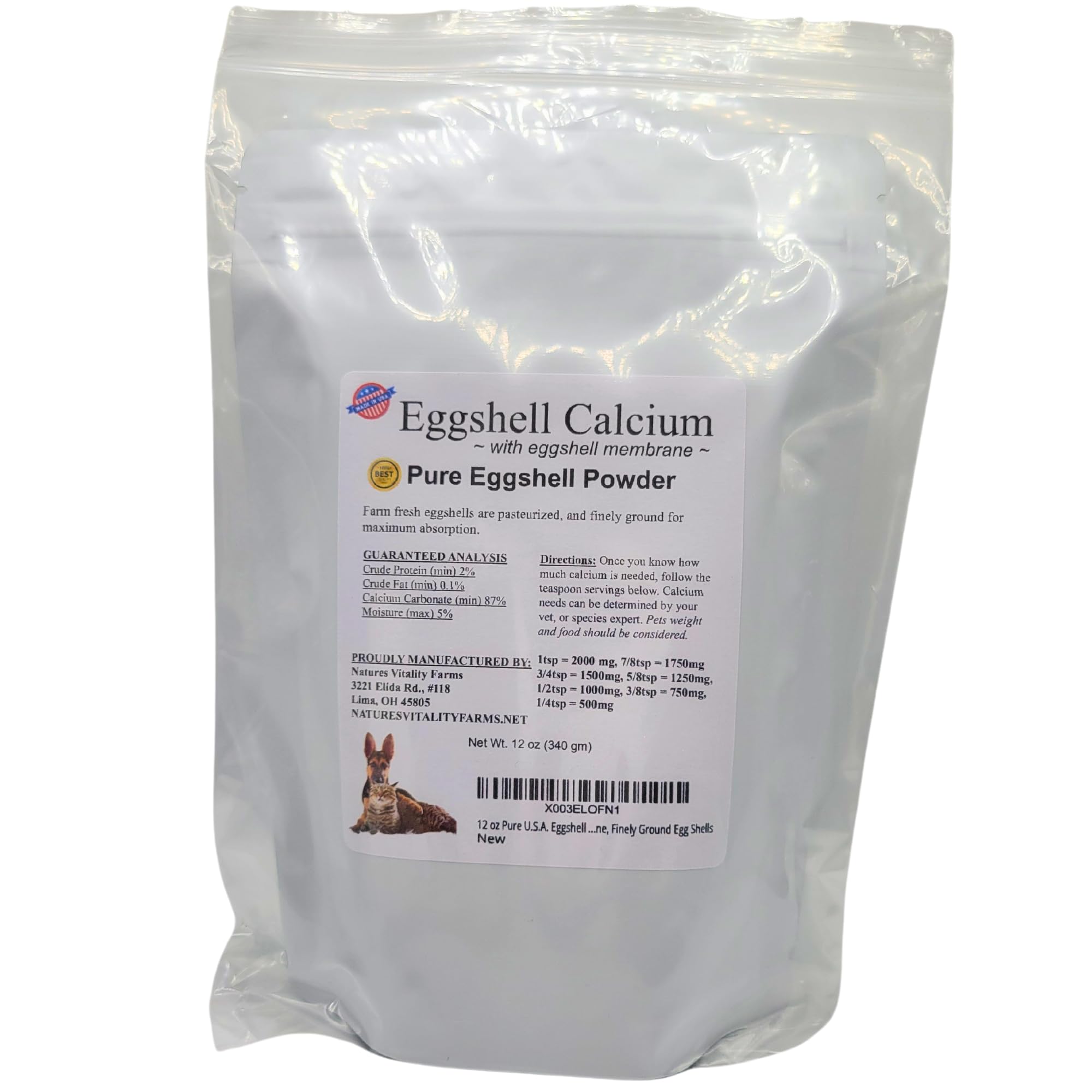 Cat enjoying kibble boosted with Natures Vitality Farms eggshell powder for nutrition.