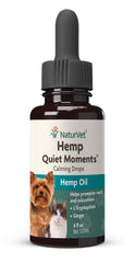 NaturVet Hemp Quiet Moments Drops administered to a dog for relaxation.