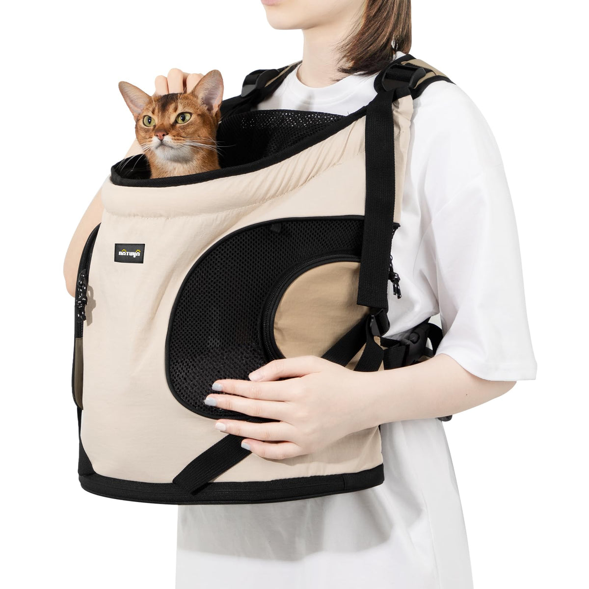 NATUYA Dog Front Carrier with X-design straps for comfortable, stable walks.