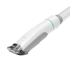 Neakasa P1 Pro kit clipper image: ergonomic design supports efficient fur trimming with vacuum assistance.