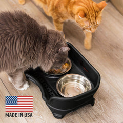 Neater Feeder Express elevated bowls, whisker-friendly, reduce neck strain during cat meals.